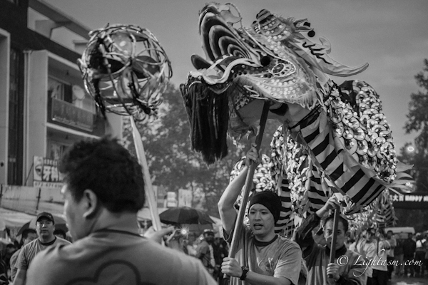 Man Leading Dragon Dancers