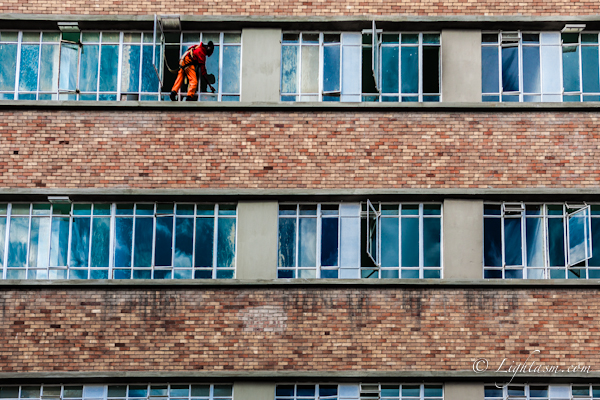 Guy Cleaning Windows