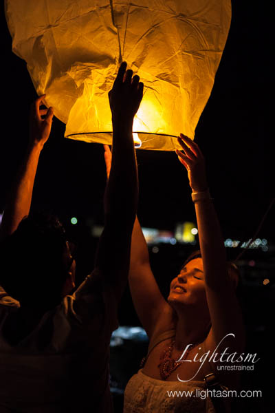 Women Releasing a Chinese Lantern